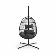 Black hanging egg chair with cushions on a white background